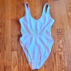 Christian Dior EUC women's soft pink one piece teddy size Med.